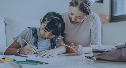 Mother and child working on homework